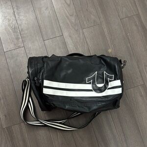 True Religion Black Messenger Bag with White Stripes